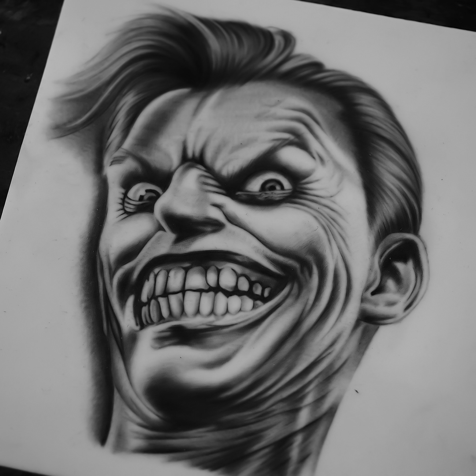 Tatuaż realistyczny twarz Jokera
